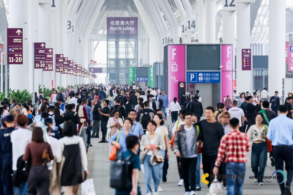 The exhibition center is filled with attendees